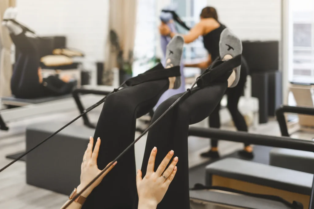 woman doing leg up while practicing pilates on ref 2026 03 19 22 08 58 utc