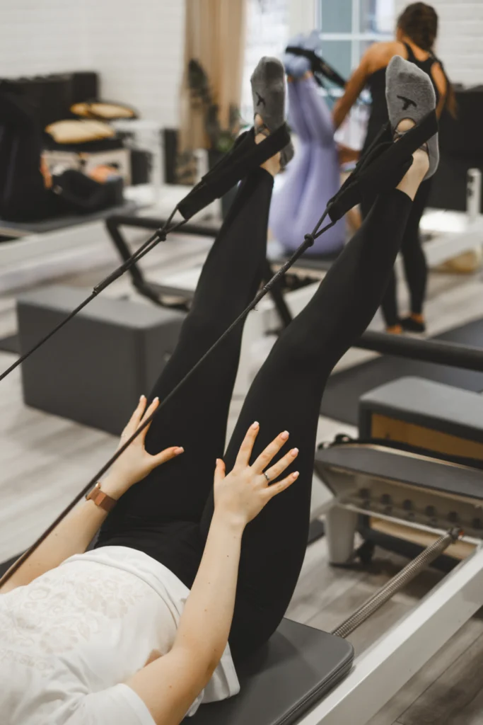 woman doing leg up while practicing pilates on ref 2026 03 24 08 57 13 utc